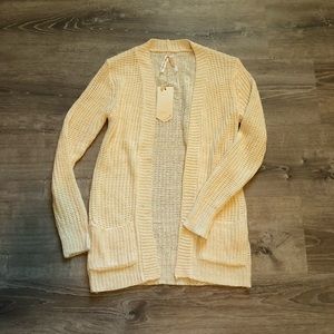 Long, cream cardigan